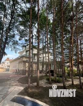 Коттедж 708м², 4-этажный, участок 12 сот.  